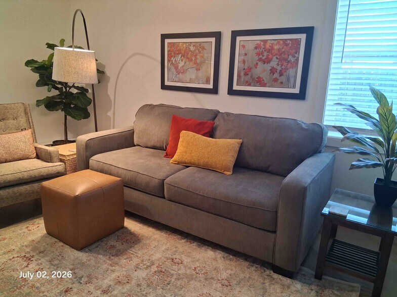 open concept living area with sofa bed - 517 18th St