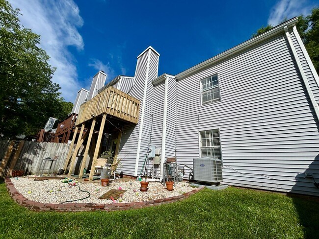 Building Photo - 3BR End Unit w/ Garage, Deck, Patio & 2 Fireplaces, Private fenced Backyard