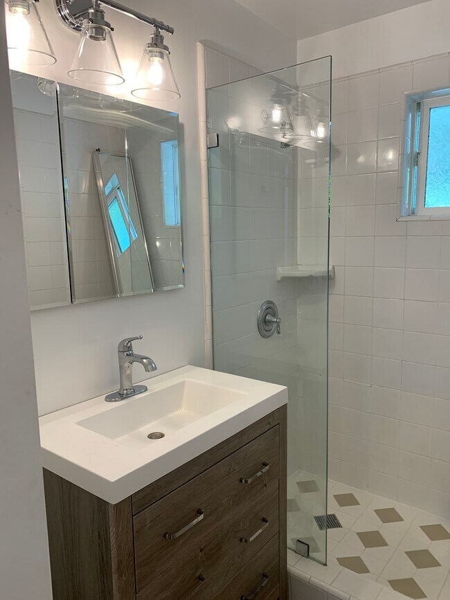 White Tile Large Shower - 10876 National Blvd