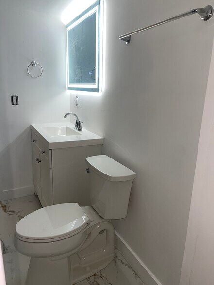 Vanity and toilet - 1405 NW 121st St