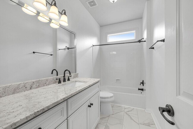 Building Photo - Welcome to this charming all-brick rental ...