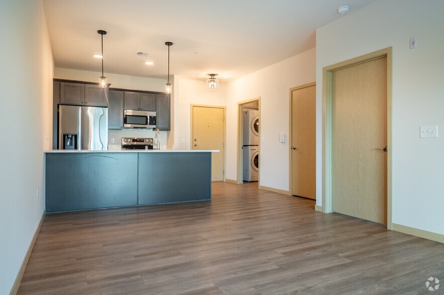 1BR, 1BA - 686SF - Living Room, Kitchen - Pleasant Hill Place - FULLY LEASED