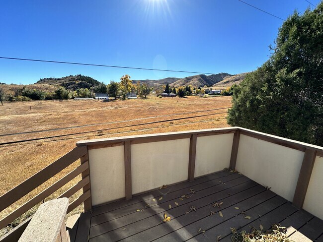 Building Photo - "Charming 3-Bedroom Condo with Hardwood Floors & 2 Full Baths in Golden, CO!"