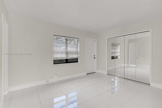 Building Photo - 5655 NE 5th Terrace