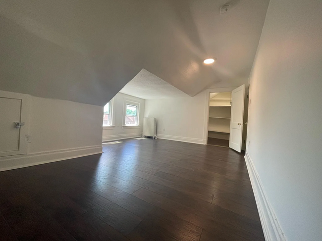 3rd floor front bedroom from back of room - 5859 Nicholson St