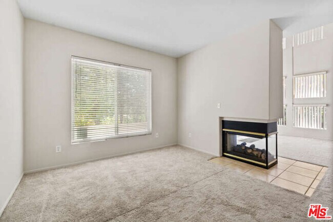 Building Photo - 10790 Rose Ave