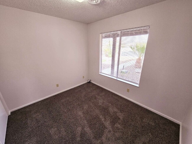 Building Photo - Spacious 4-Bedroom Oasis with Elegant Granite Touches in Vibrant Las Vegas!