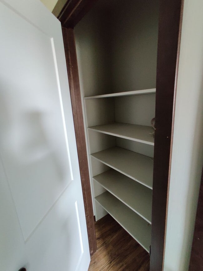 Building Photo - Conveniently located Riverbend Apartments feature a quiet community with a large green space