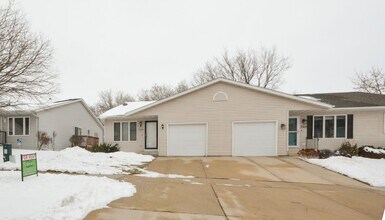 Building Photo - Twin home with walk-out basement & great updates!