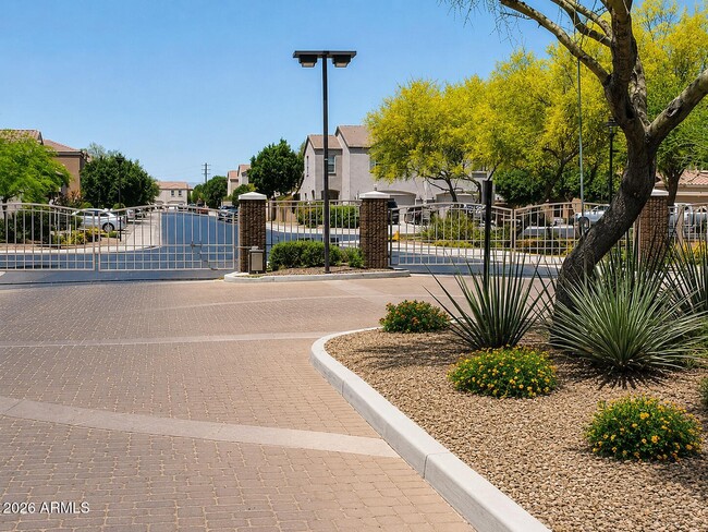 Building Photo - 8773 W Dahlia Dr