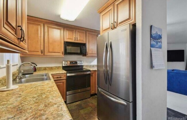 Building Photo - Charming 2BR Condo in Denver