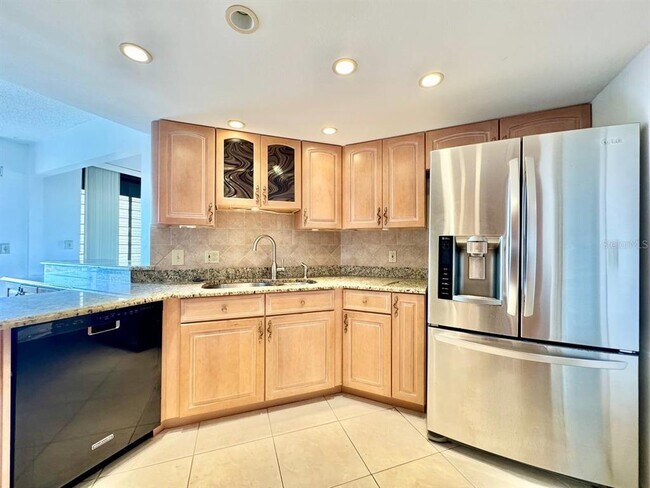 Building Photo - 5950 Pelican Bay Plaza S