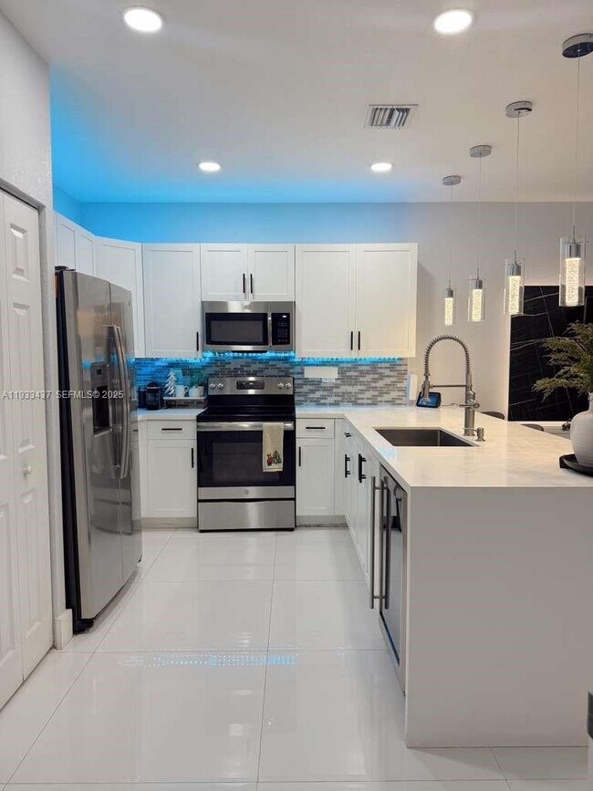 Building Photo - 10598 West 33rd Ct