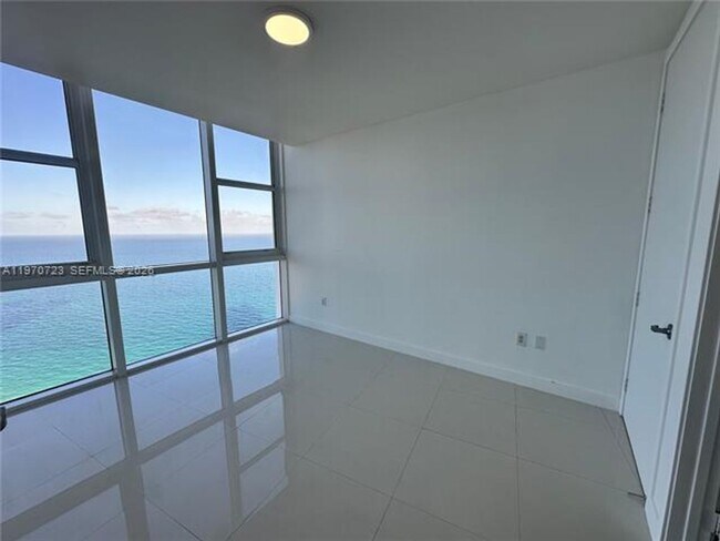 Building Photo - 18201 Collins Ave