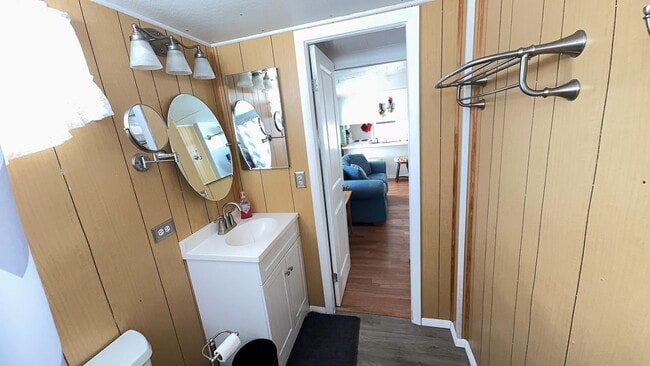 Building Photo - Beautiful fully furnished one bedroom, one bath manufactured home in a 55+ deed restricted gated ...