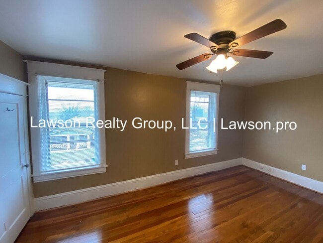 Building Photo - Updated Three Bedroom with Flat Yard