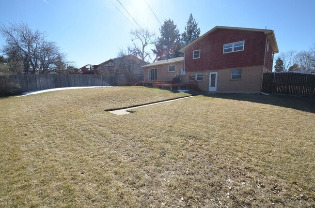 Building Photo - 4 bedroom home in Northglenn.  Newer paint with a large floor plan, wood floors & large deck for ...