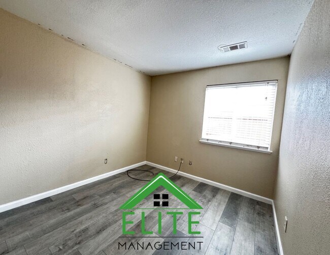 Building Photo - **Spacious 3-Bedroom Condo with 2-Car Gara...