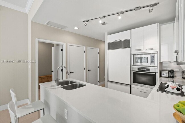 Building Photo - 6799 Collins Ave