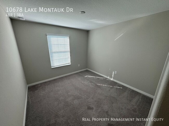 Building Photo - 10678 Lake Montauk Dr