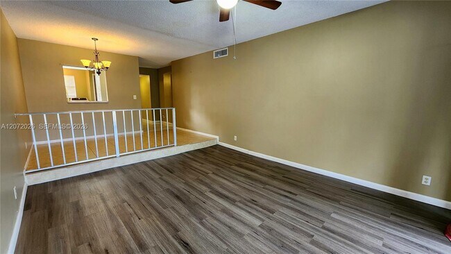 Building Photo - 2700 Coral Springs Dr
