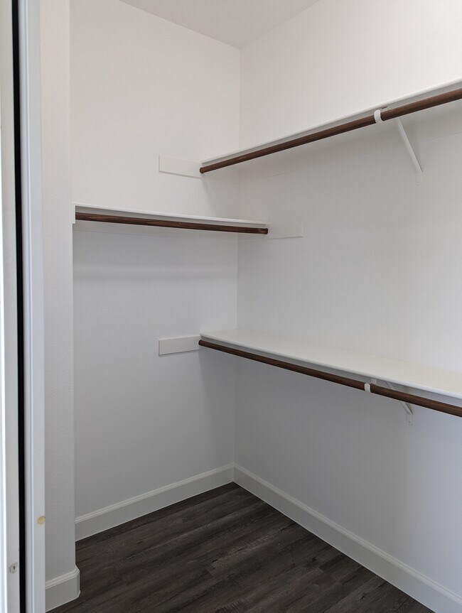 Walk-in closet in main bedroom - 305 W Duarte Rd