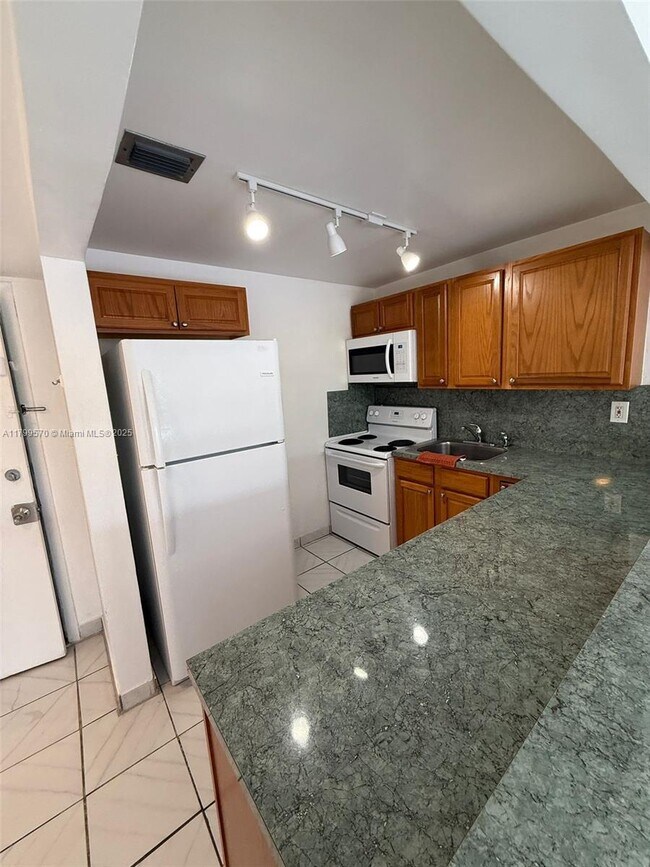 Building Photo - 17101 NW 57th Ave