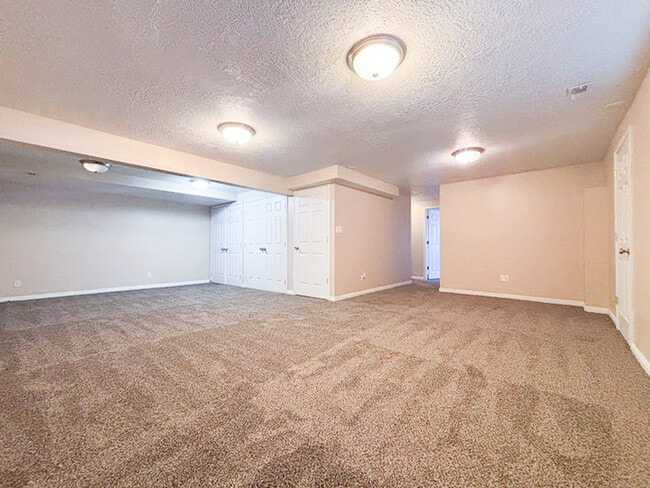 Building Photo - Spacious 5-Bedroom Home in Stansbury Park ...