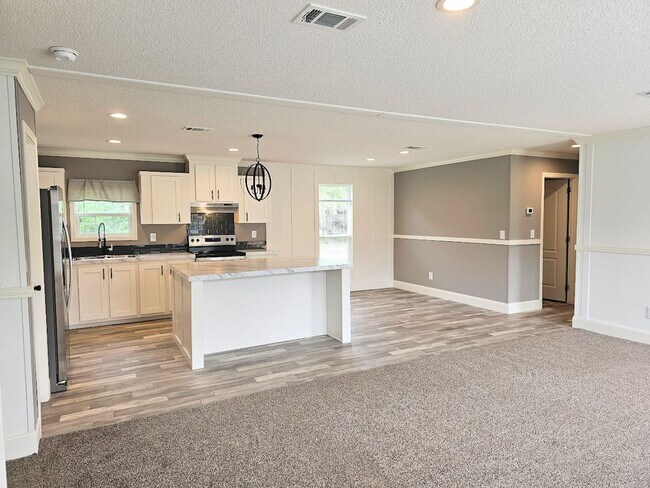 Building Photo - Welcome Home! Spacious 3-Bed, 2-Bath Split Floor Plan on ¾ Acre Lot