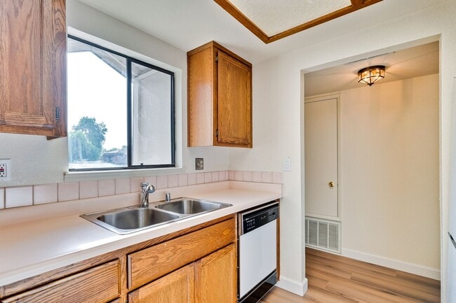 Building Photo - New Vinyl Plank Flooring, Fresh Interior Paint, 1 Car Garage + 1 Assigned Outdoor Parking Space -...