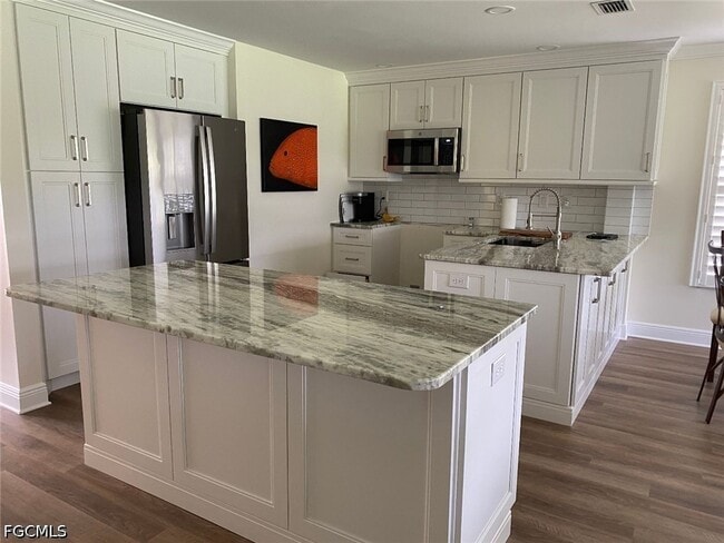 Building Photo - 8361 Grand Palm Dr
