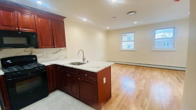 Building Photo - 23-68-68 37th St