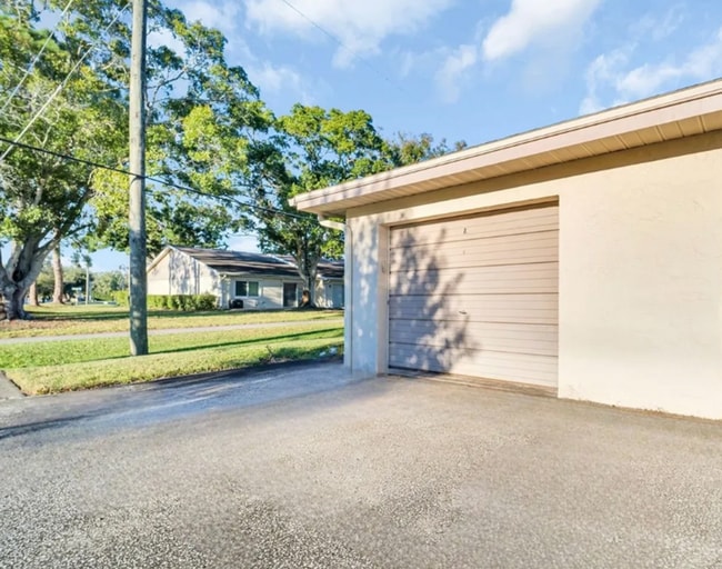 Building Photo - MUST BE 55+ TO RENT THIS CONDO