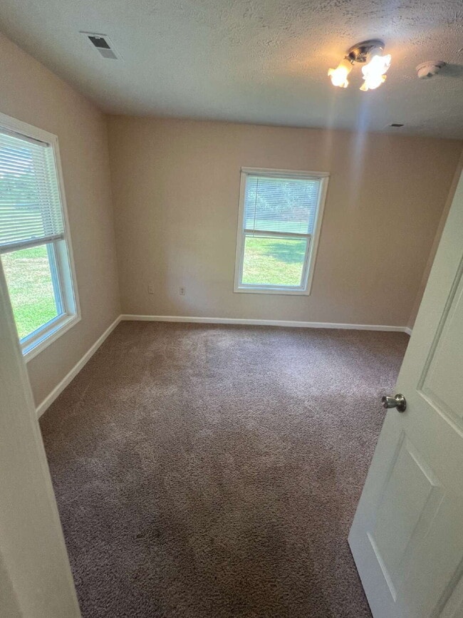Building Photo - Charming 2-Bedroom Home Plus Bonus Attic S...