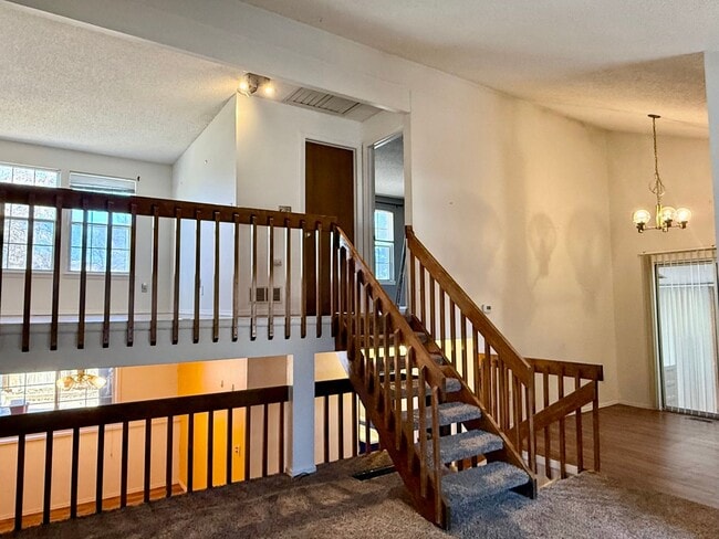 Building Photo - Open Tri-Level Townhome With Tons Of Space...