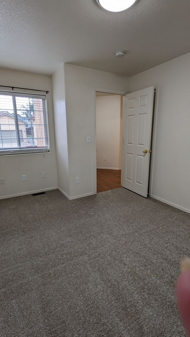 Building Photo - RANCH 3 BED/2.75 BATH PATIO HOME WITH MAIN FLOOR MASTER, FINISHED BASEMENT, AC, 2 CAR GARAGE!