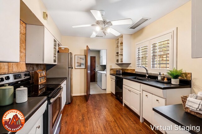 Building Photo - Bright & Inviting 2-Bedroom Home with Fenced-In Yard, Garage & Lawn Care Included