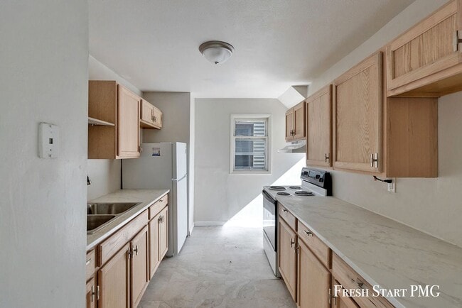 Building Photo - Comfort, Convenience & Community in Lansing
