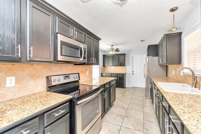 Building Photo - 13406 Splintered Oak Dr