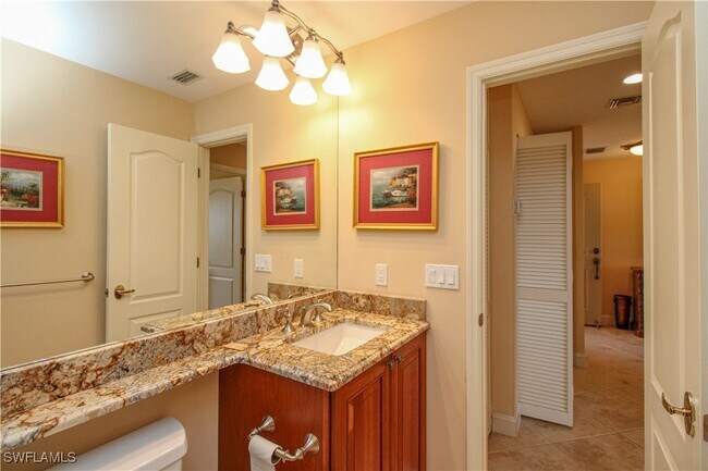 Building Photo - 7024 Pelican Bay Blvd