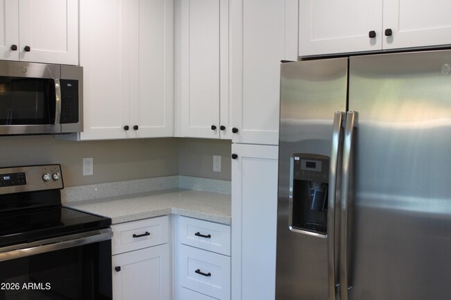 Building Photo - 1550 N Stapley Dr