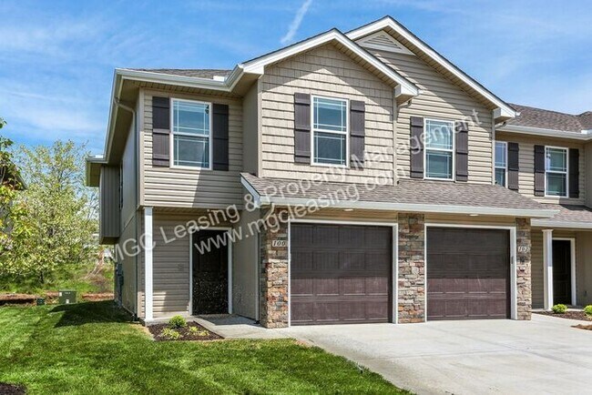 Building Photo - Serrano Townhomes: Modern Comfort & Cozy Kansas City Living + $500 off rent - ask me how