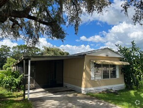 Building Photo - HUGE (3BR/2BA) w/Carport & Screened Porch ...