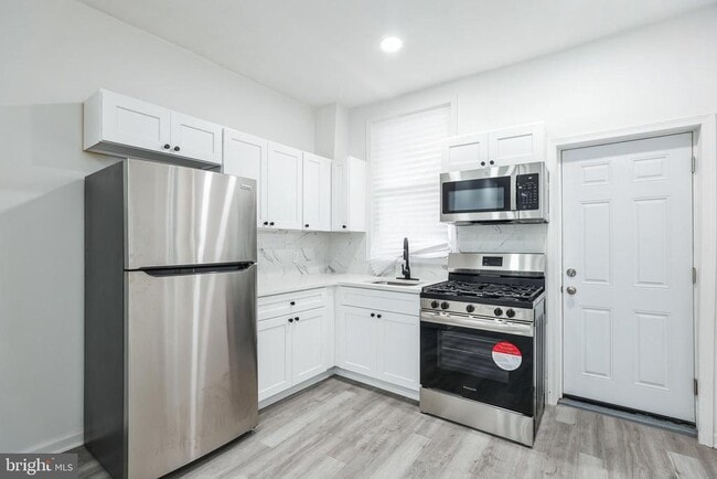 Building Photo - 5540 Harmer St