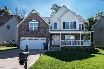 Building Photo - Pet Friendly Three Bedroom with Bonus!