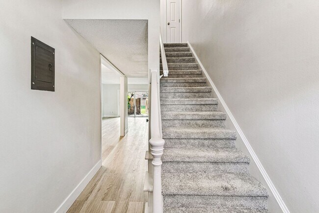 Building Photo - 2X2.5 -MOVE IN NOW! NEW LVP FLOORING ON 1ST FLOOR! NEW CARPET ON 2ND FLOOR! WATER VIEWS! CALL TOD...