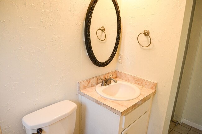 Building Photo - Check out this huge private fenced back yard at this Timberlane home!