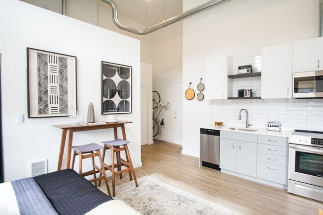 Building Photo - App Fee Special: Sleek & Modern Studio w/Condo-Grade Finishes + Patio!