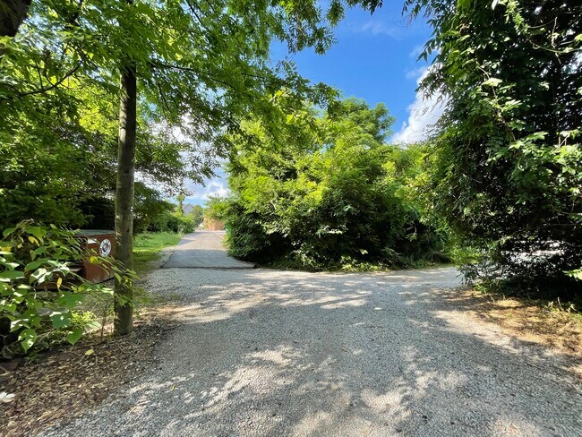 Entrance to back parking lot/Dumpster - 1900 Courtney Dr