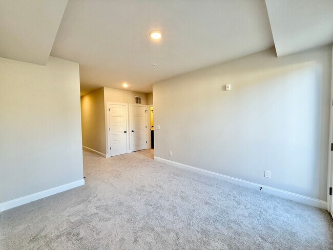 Building Photo - Stunning New Construction 2BD, 2.5BA Cary Townhome-Style Condo with a 1-Car Garage & Bonus Flex S...